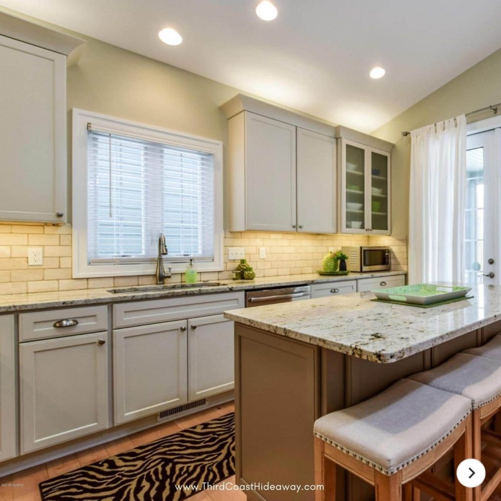 Kitchen with island and stainless appliances