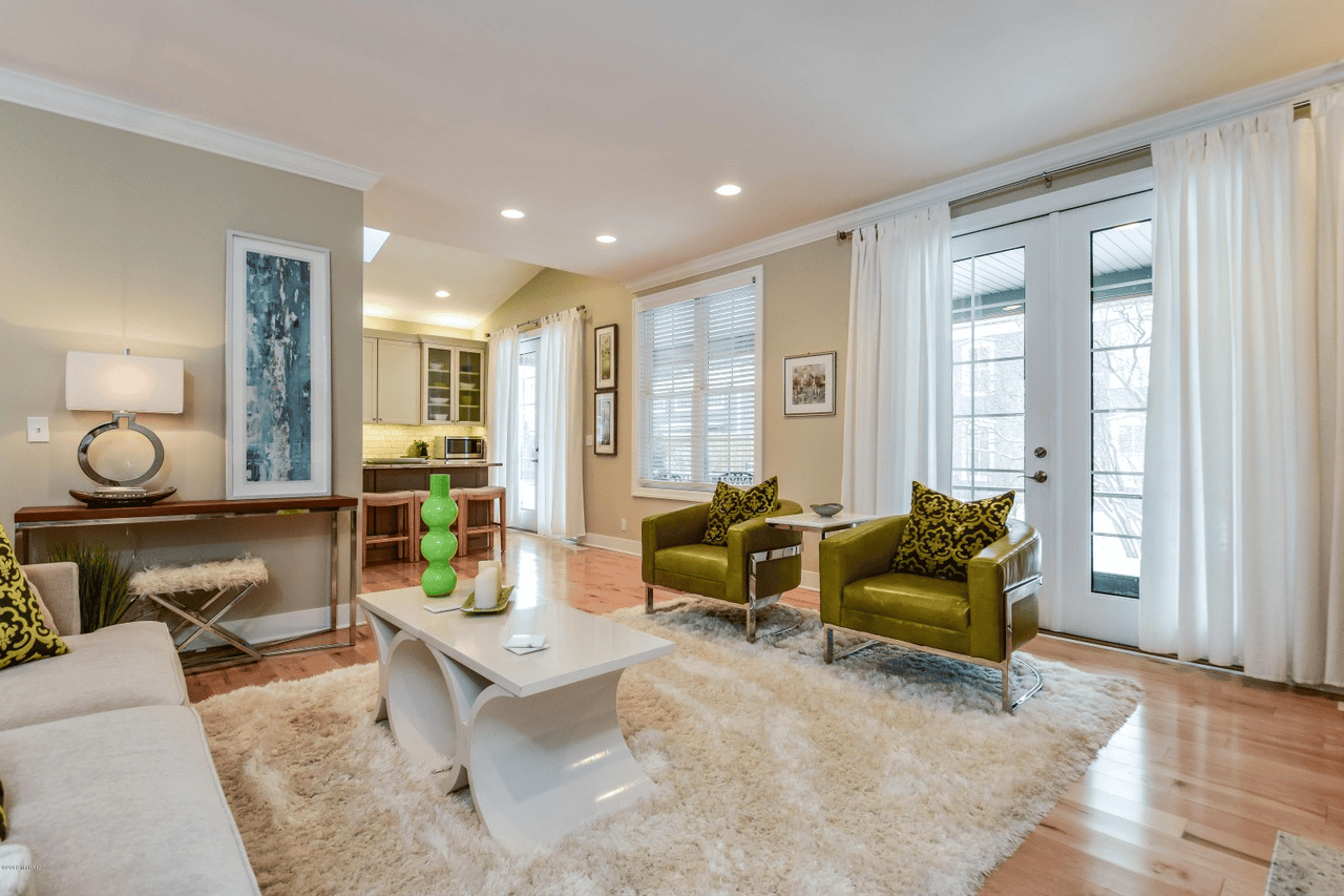 Living room with green chairs